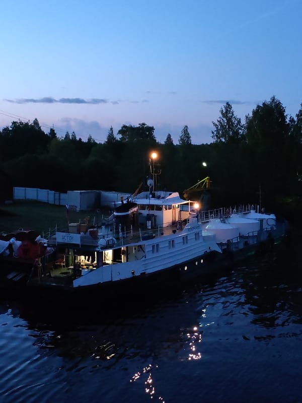 Ship 'ICTOK' spotted docked at night near Annensky Most