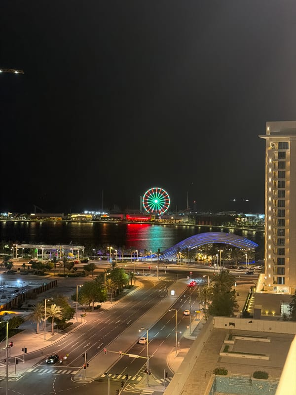 Nighttime waterfront entertainment district observed in Lusail City, Qatar