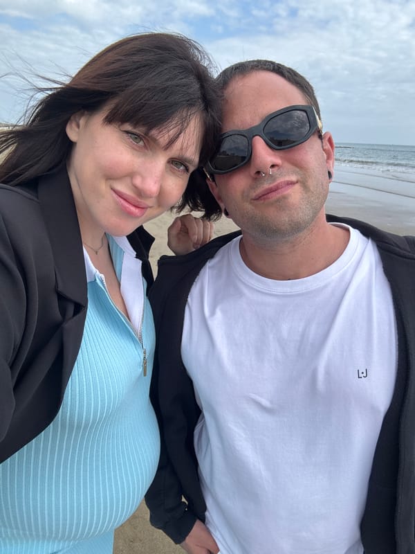 Couple and dog spend afternoon at Nettuno beach
