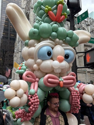 Costumed street performers gather in rainy NYC Sunday afternoon