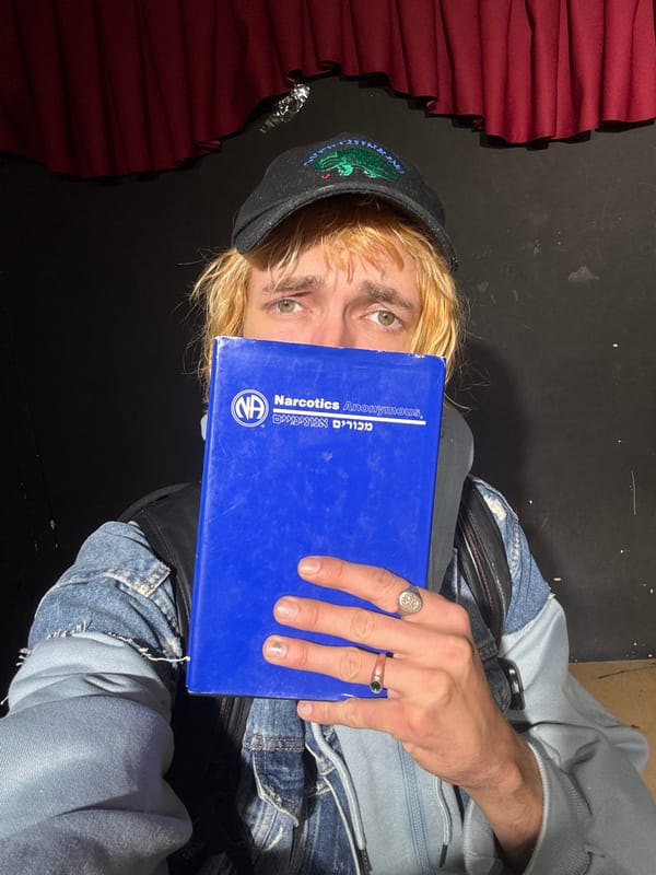 Person with recovery materials observed near discarded belongings in Jerusalem