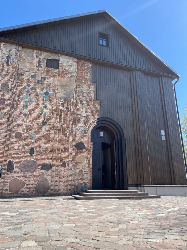 Historical church building photographed under clear skies in Hrodna