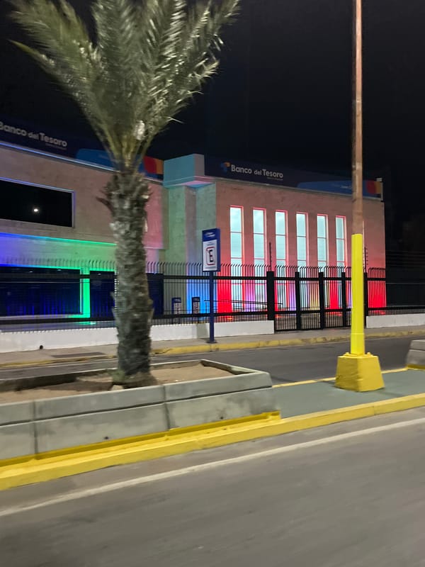 Nighttime tour captures illuminated Juan Griego landmarks and streets