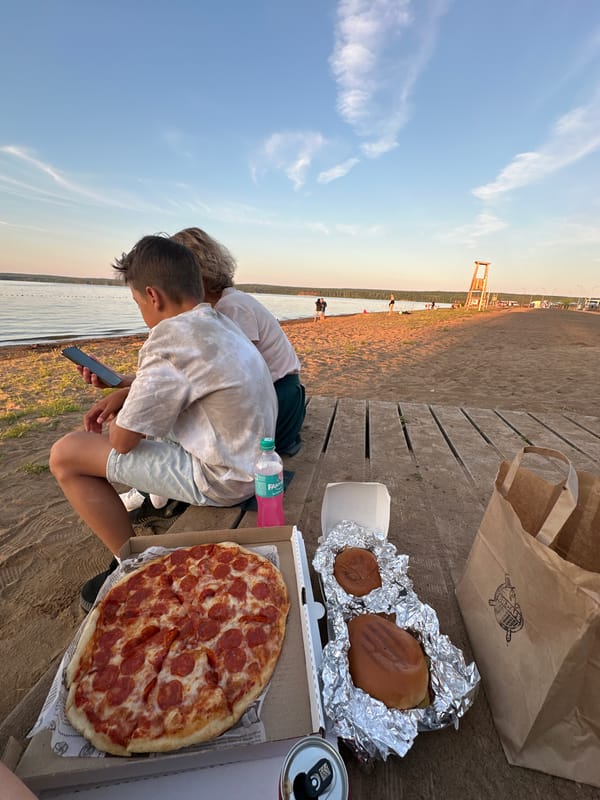Pizza and chill by the lake at golden hour