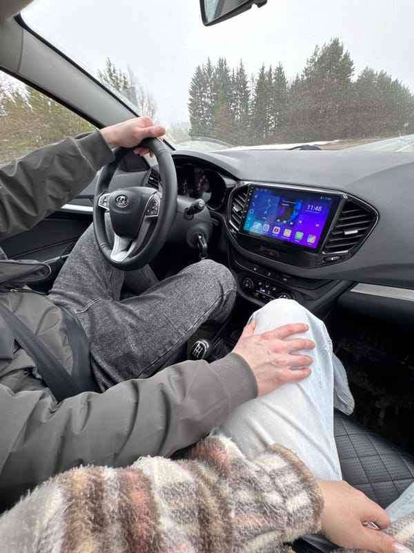 Early morning car journey through foggy Votkinsk captured intimately