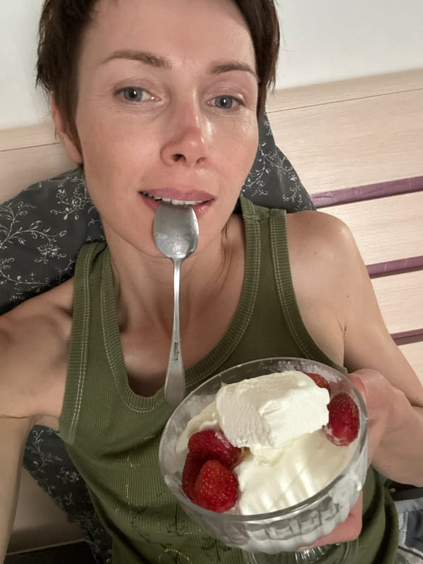 Snacking on ice cream and strawberries in bed, Kemerovo