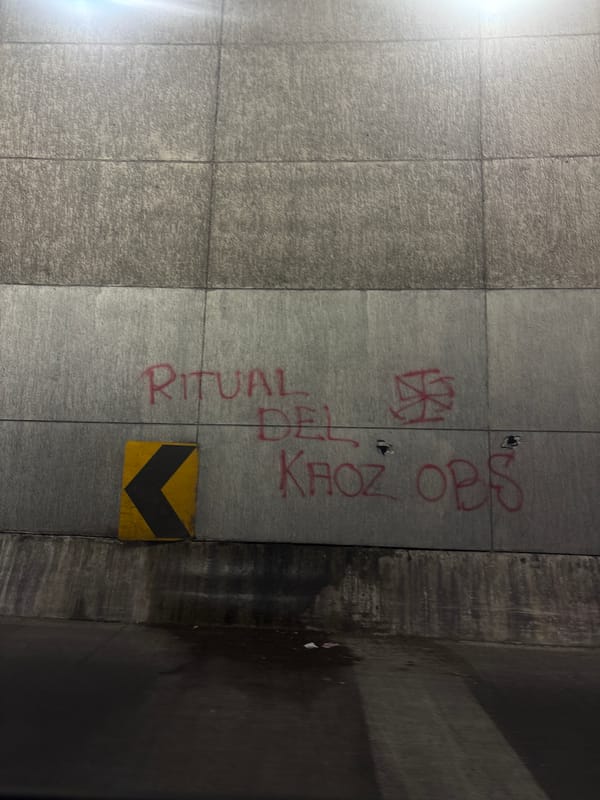 Red graffiti "RITUAL DEL KHOZ OPS" documented on Mexico City wall