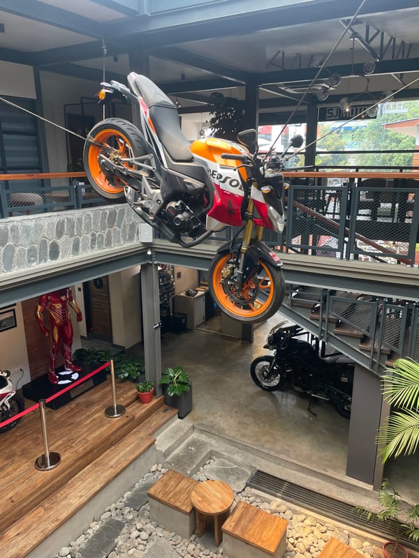 Motorcycle showroom with superhero displays documented in Pokhara, Nepal