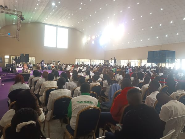 Live performance event at a large hall in Gura Top, Nigeria