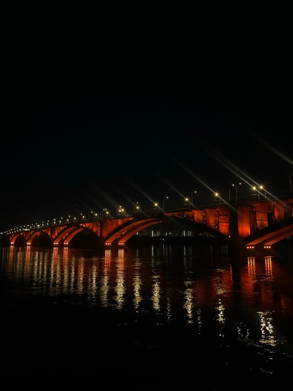 Illuminated bridge observed at night in Krasnoyarsk, Russia