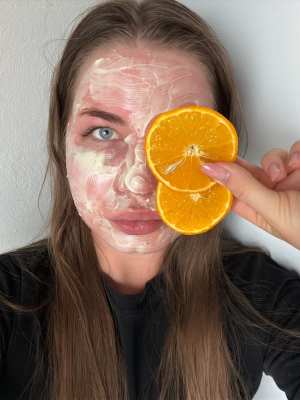 Woman documents facial mask beauty treatment in Chaikovsky salon