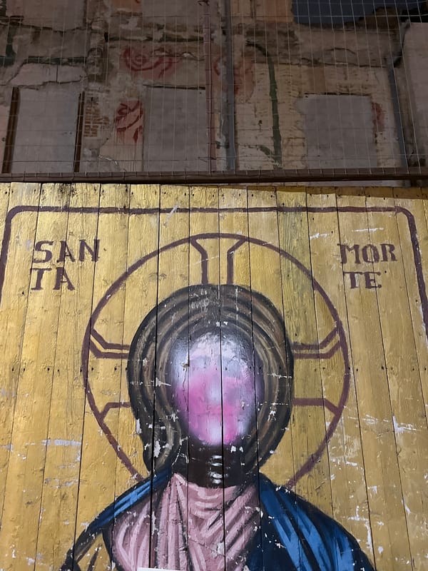 Religious icon fragment spotted on Palermo wall