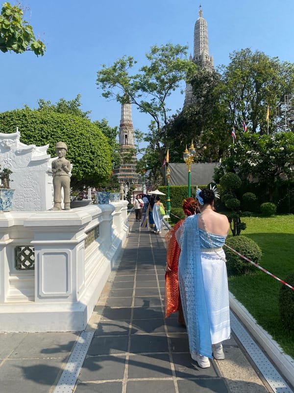 Traditional dress, temple visits documented at Bangkok's Wat Arun