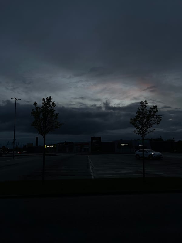 Dramatic cloud formations observed over Aalborg parking lot at dusk