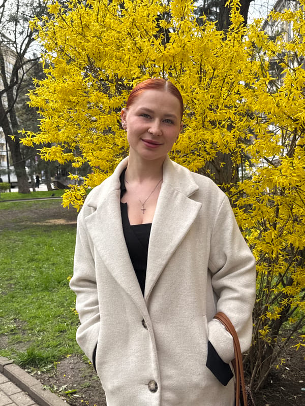 Spring portraits captured near blooming forsythia in Ovoshchnoy, Russia