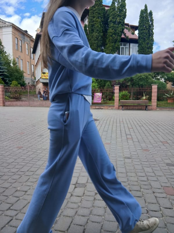 Pedestrian activity around Truskavets plaza and dining areas