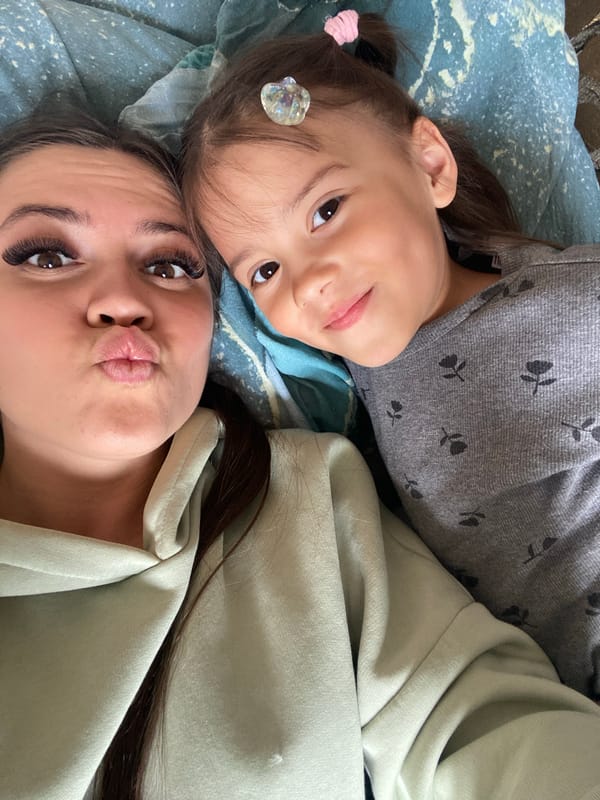 Mother and child share quiet morning moments in rural Russia