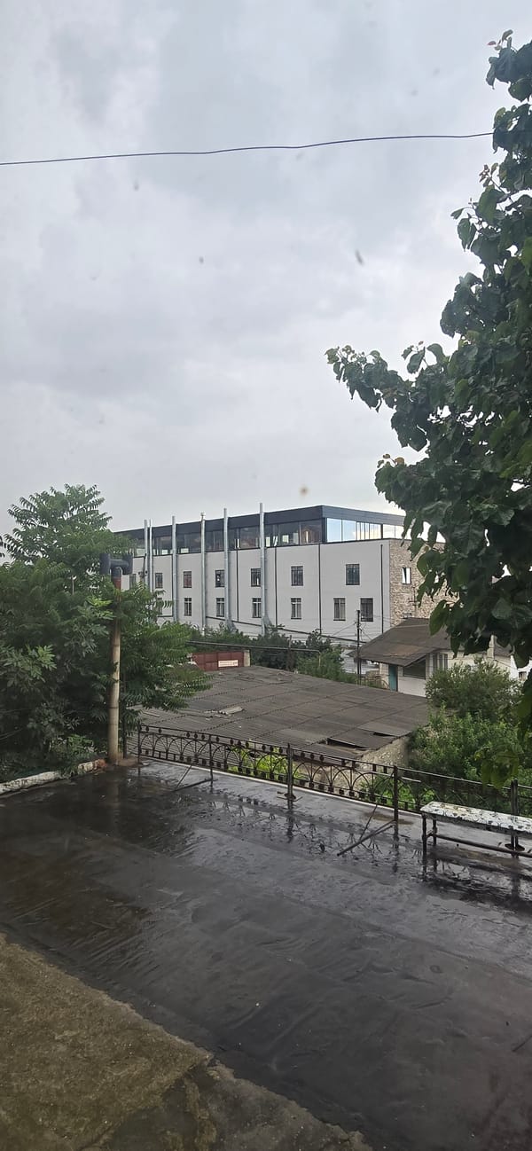 Quiet morning inside a Makhachkala apartment, indoors and out