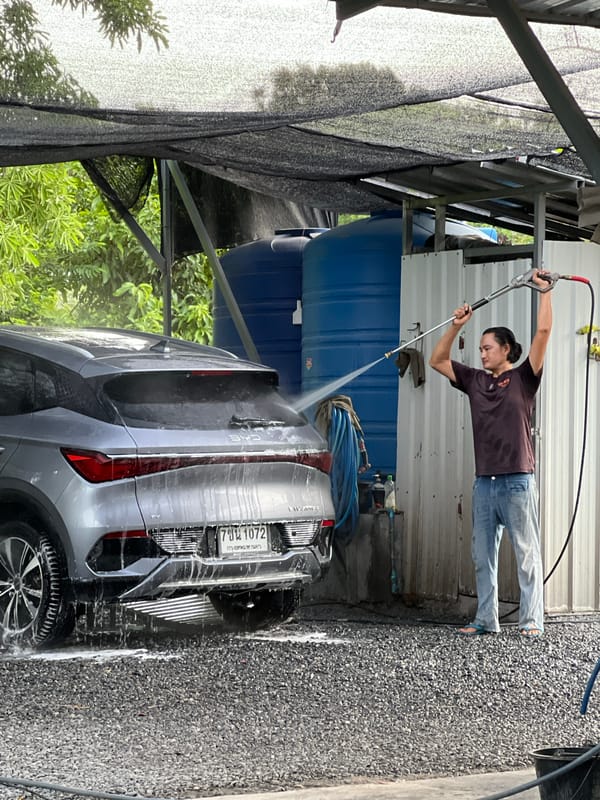 Full-service car wash in action at Ban Bang Rak, Samui