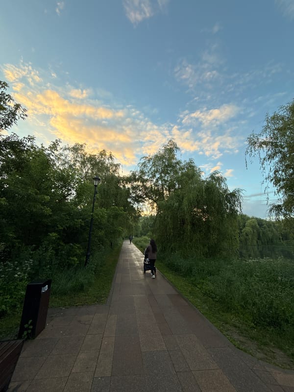 Evening stroll through a Moscow park at golden hour