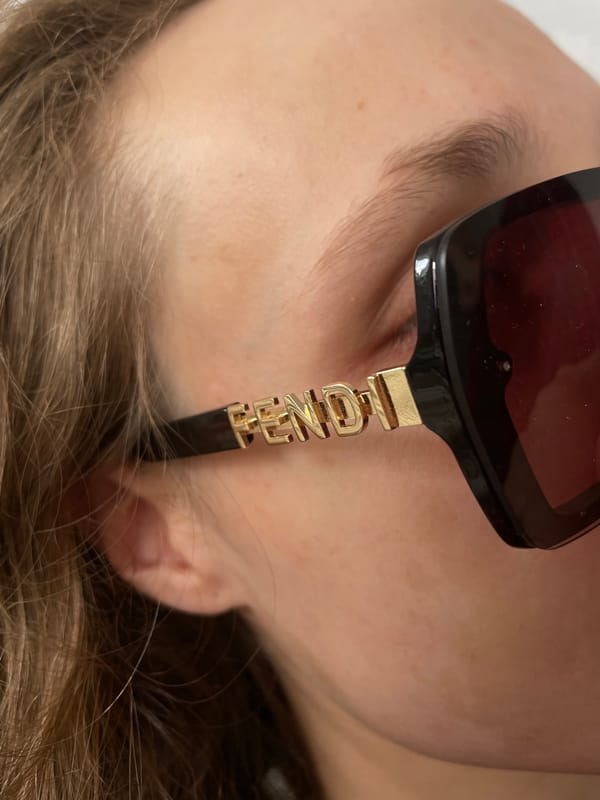 Woman documents morning routine in plaid outfit, Sharkan Russia