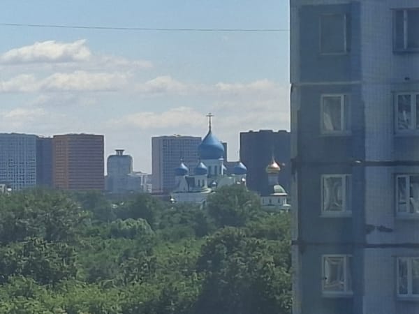 Summer morning scenes across a Moscow residential neighborhood