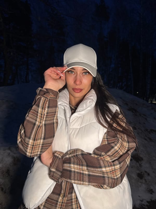 Two women photographed during winter gathering in Chaikovsky, Russia