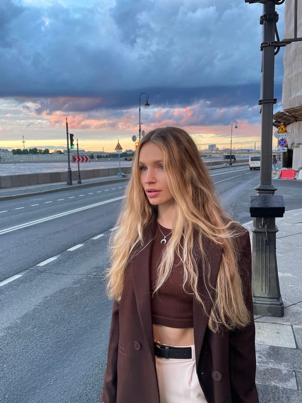 Sunset stroll along a waterfront promenade
