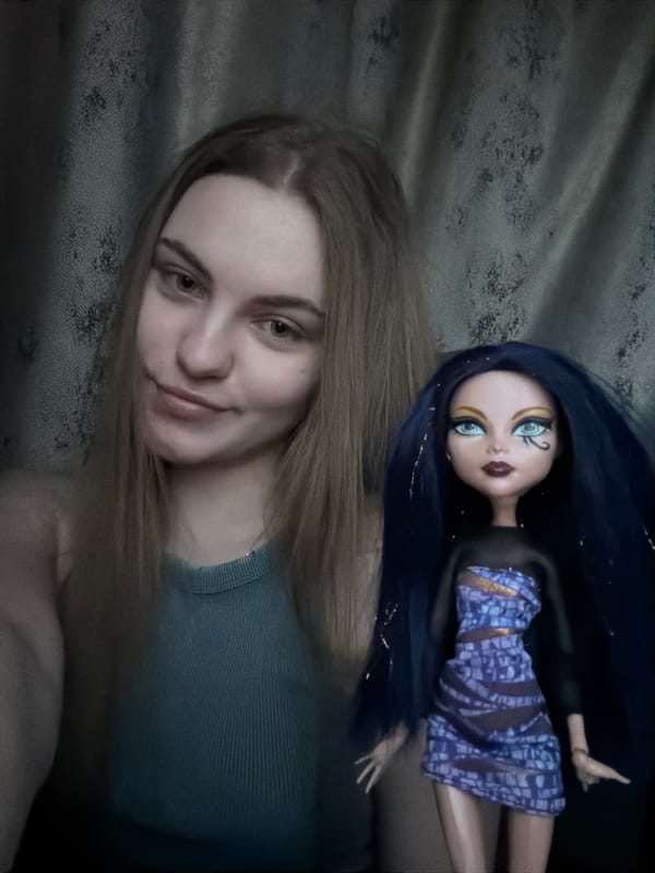Casual indoor selfie session with a doll and a book, Dnipro