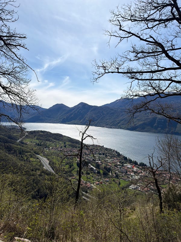 Tourists enjoy scenic Lake Como views in Lierna, Italy