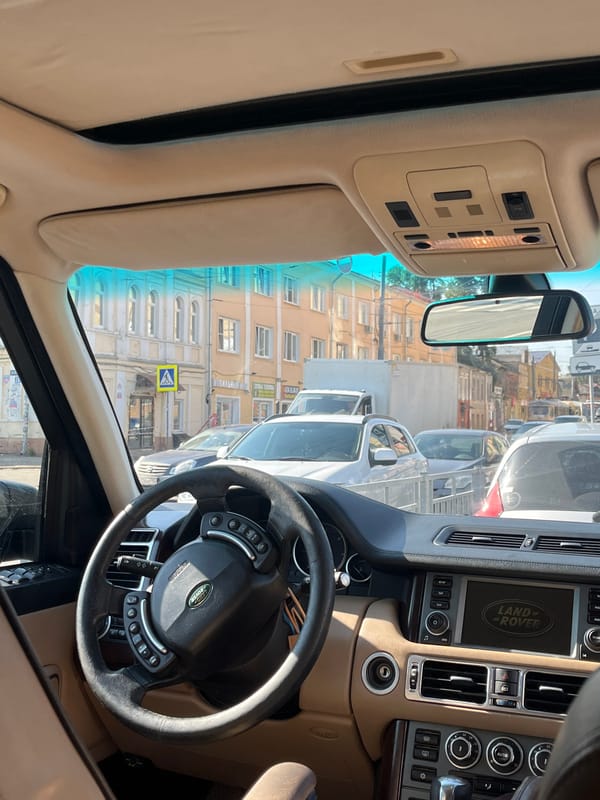 Drinks in the car, Nizhny Novgorod streets rolling by
