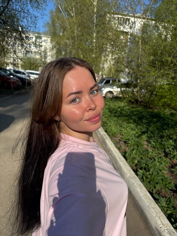 Woman poses for outdoor portraits in early morning Izhevsk