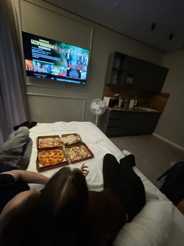 Hotel guests enjoy casual takeout dinner in Ufa room