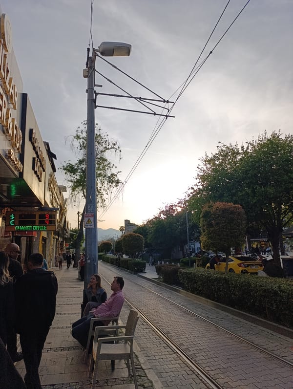 Tourist captures afternoon street life and landmarks in Antalya