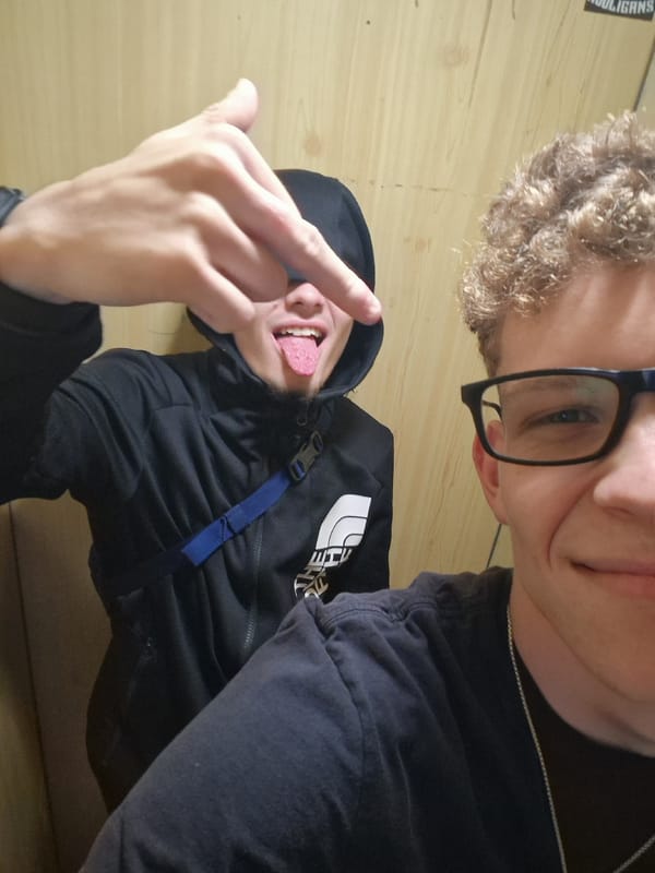 Two men photographed indoors in Sofia casual setting
