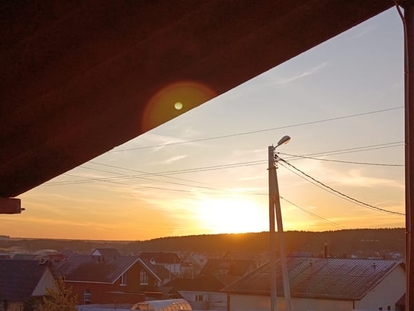 Sunrise captured over Chaikovsky, Russia residential area