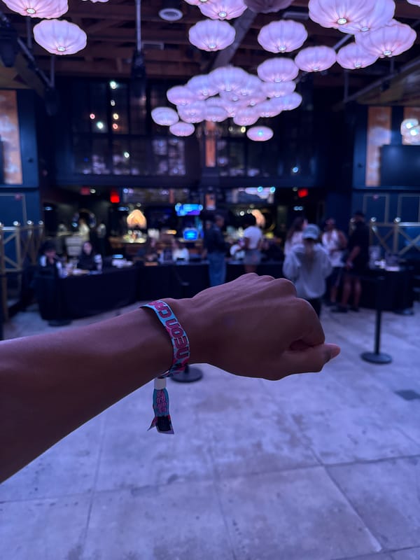 Fist raised at crowded indoor event in Los Angeles