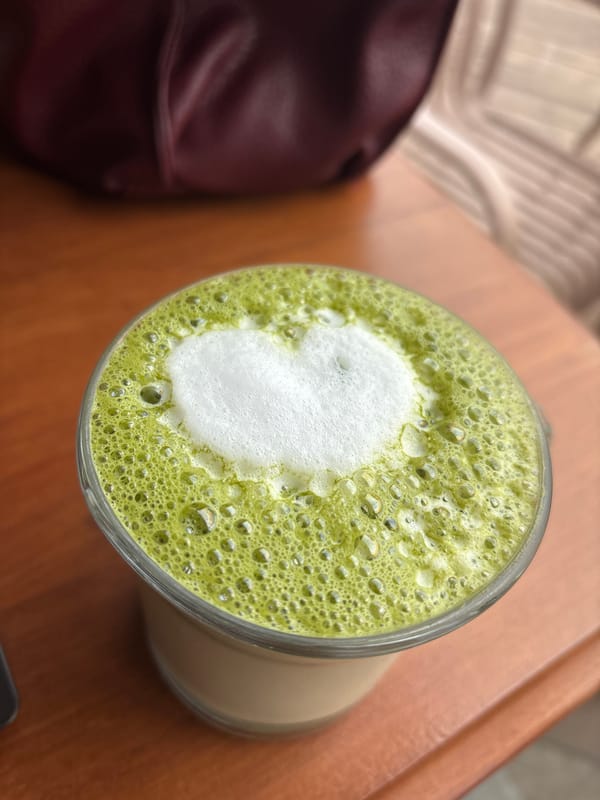 Matcha latte with heart foam art photographed in Varna