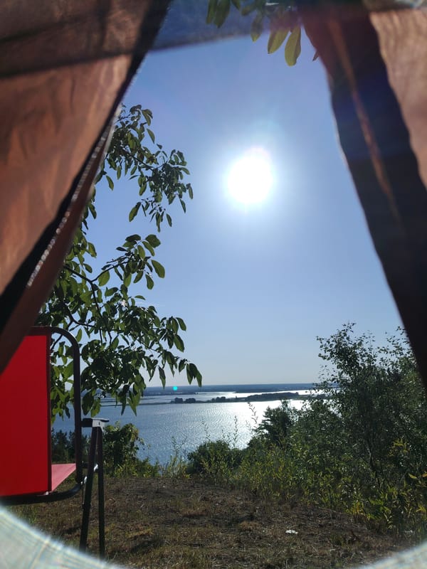 Sunny morning at a riverside campsite near Staiky, Ukraine