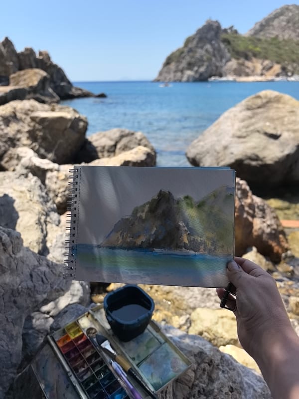 Watercolor painting in progress on the Datça shoreline