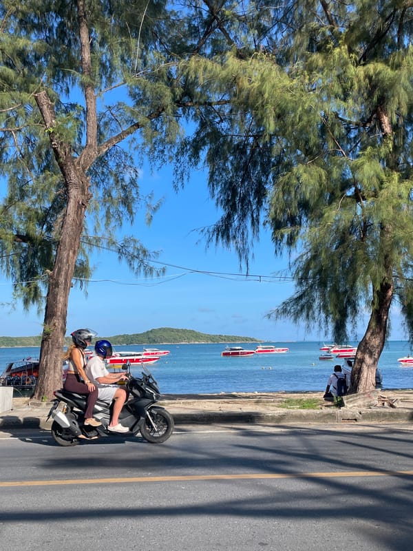 Scooter ride along Rawai's sunlit coastal road