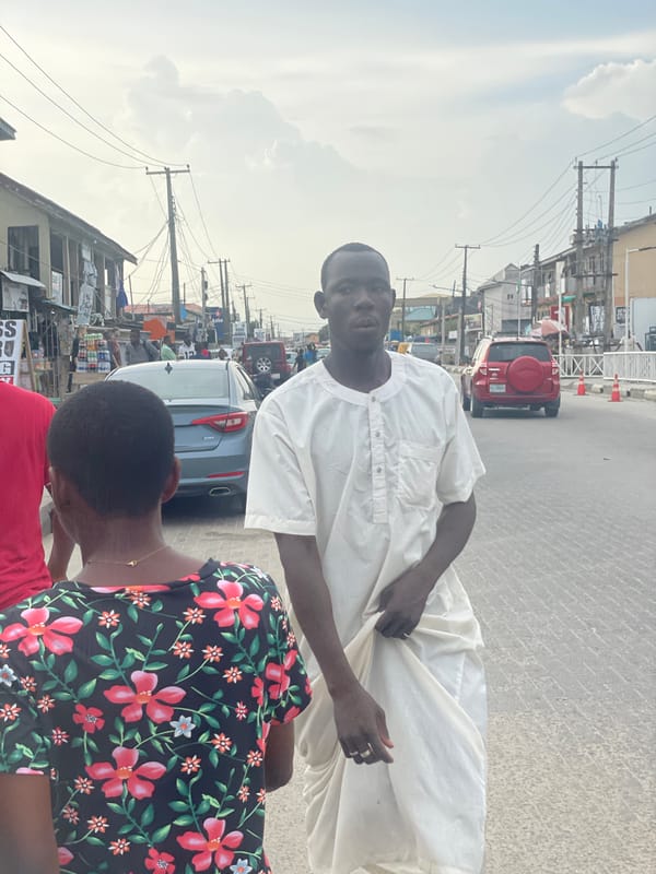 Daily street life documented in Ado, Nigeria commercial district