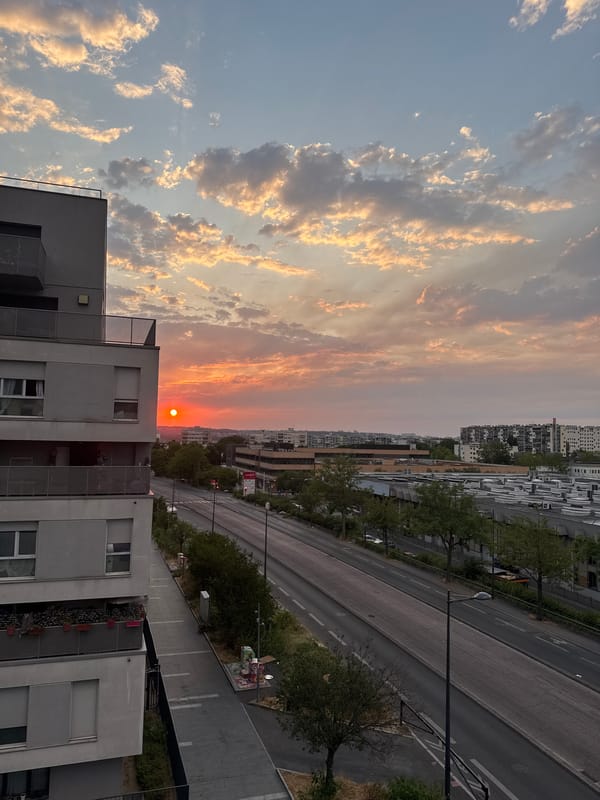 City sunset shot from multiple angles, warm sky, four minutes