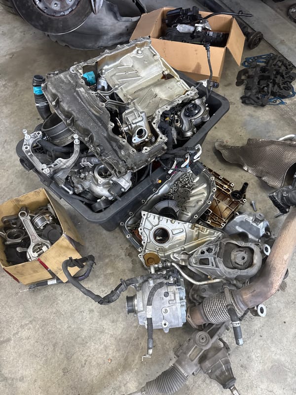 Porsche SUV stripped down for repairs in Chișinău workshop