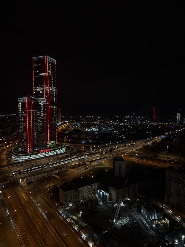 Full moon and illuminated skyscrapers observed in Khimki
