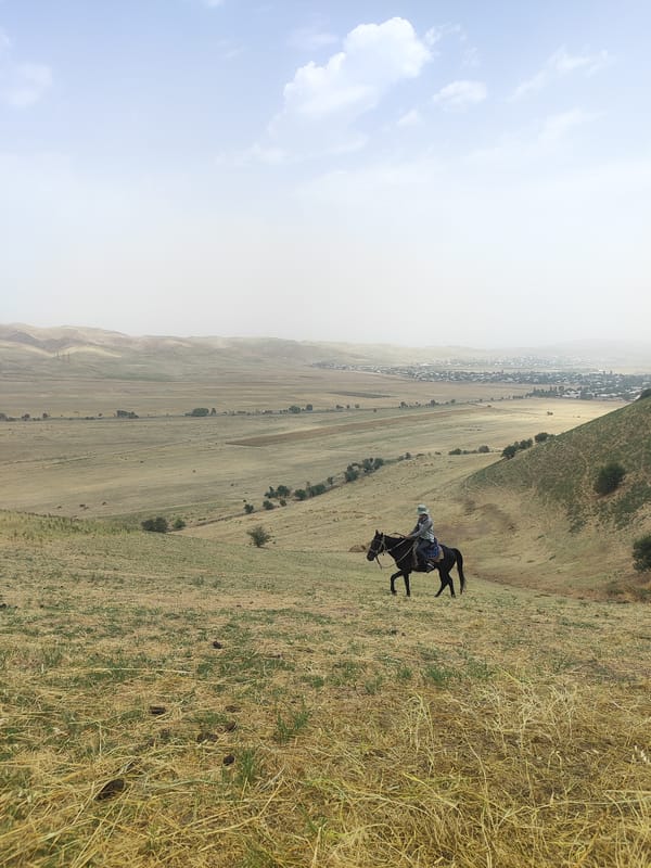 Horseback riding and hilltop views in rural Tajikistan