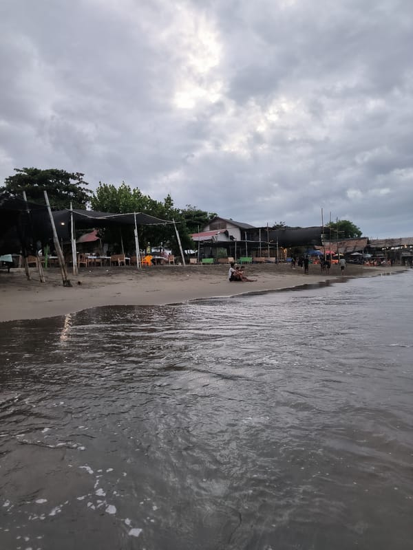 Family enjoys beach day in Lhokseumawe, Indonesia