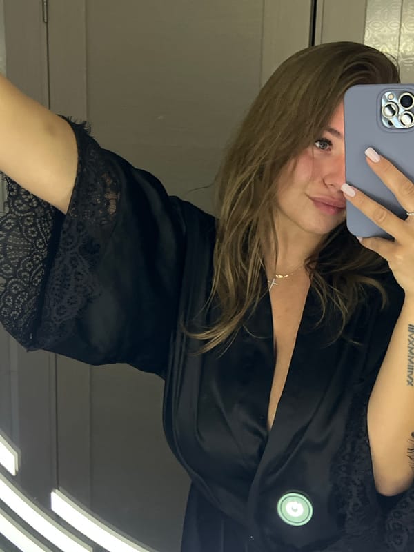 Woman takes bathroom selfies in Budva, Montenegro apartment