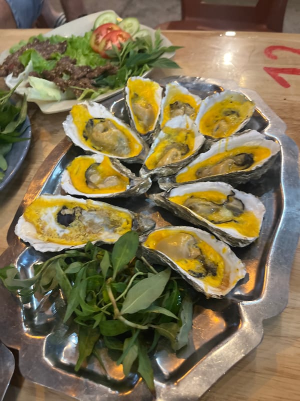 Grilled oysters and fried shrimp at a Nha Trang seafood spot