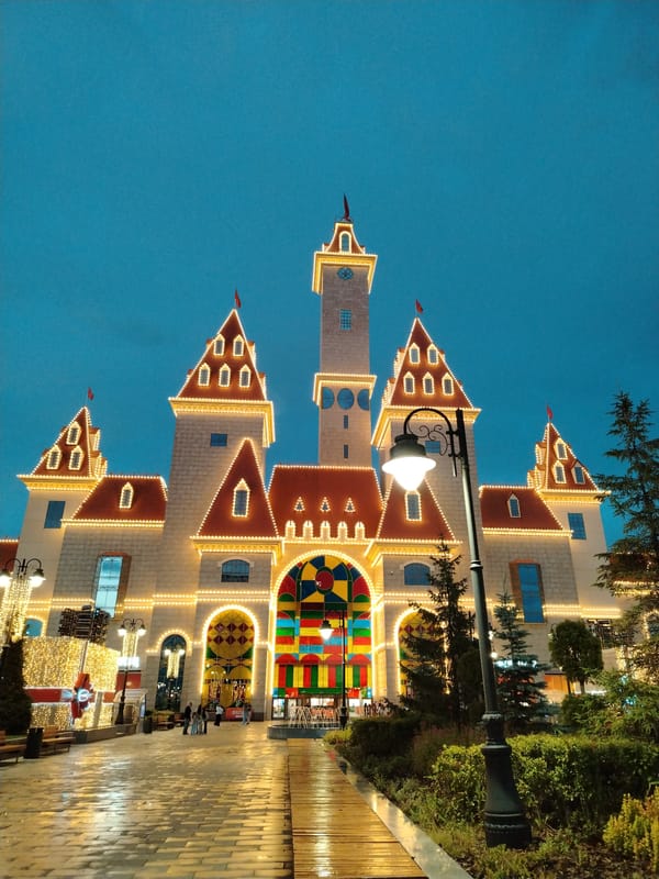 Exploring a fairytale-themed amusement park at dusk